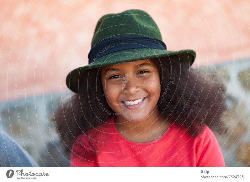 Pretty girl with long afro hair Elegant Happy Beautiful Face Winter Garden Child Human being Woman Adults Infancy Park Fashion Hat Brunette Afro Smiling