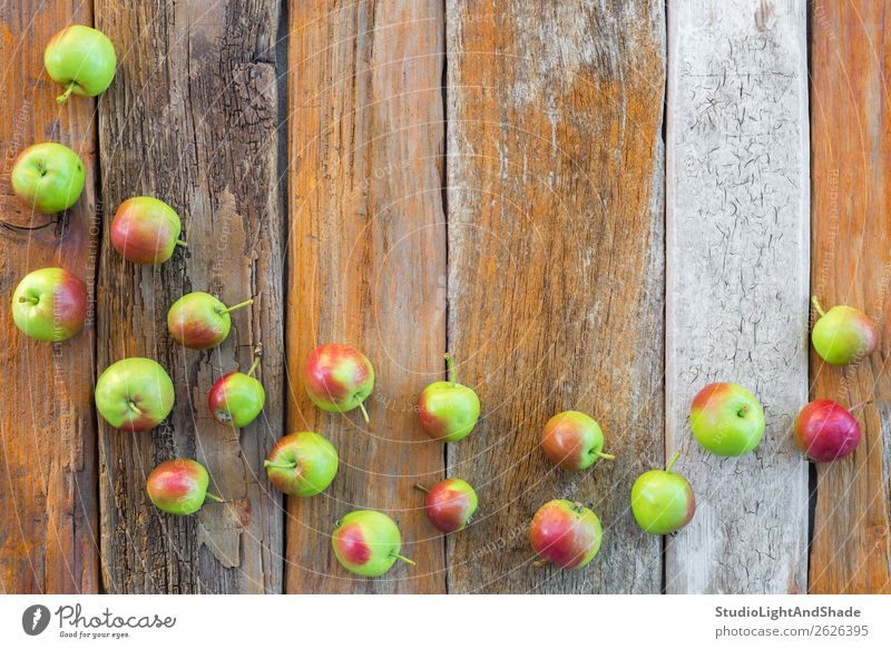 Green and red apples on vintage wooden background Food Fruit Apple Nutrition Organic produce Vegetarian diet Summer Garden Gardening Agriculture Forestry Nature