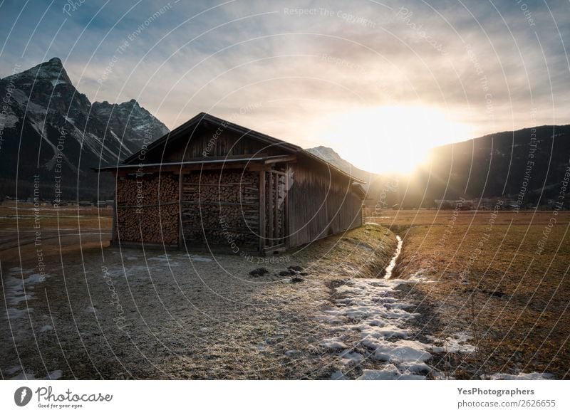 Barn with firewood at sunset in the Alps Vacation & Travel Winter Snow Mountain Nature Landscape Weather Meadow Peak Village Hut Bright Austria Austrian barn