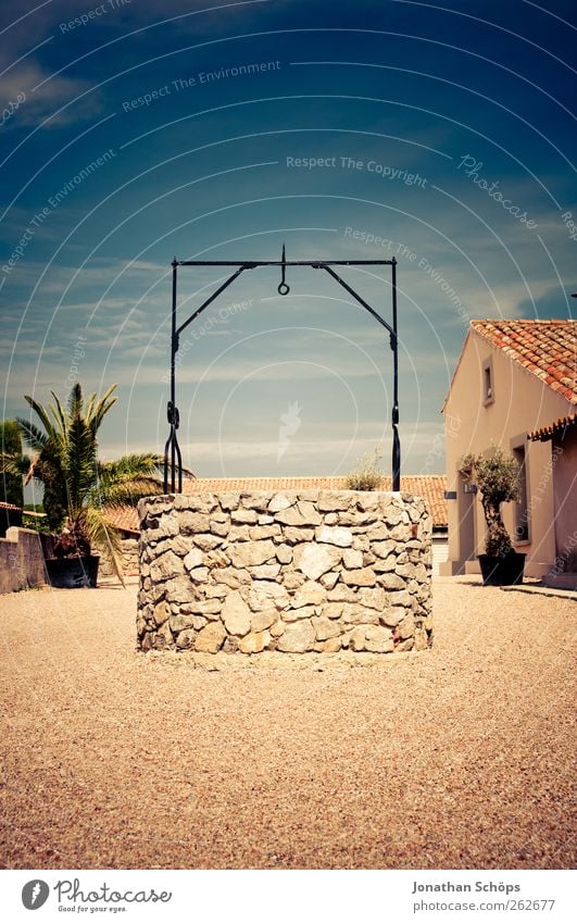 The fountain Trip Summer Sun Discover Well Gravel House (Residential Structure) Palm tree South Warmth Vignetting Empty Drought Dried Exotic Stone Hang up