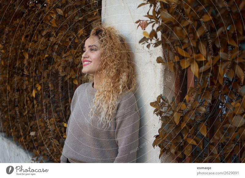 Portrait of Young woman outdoors Lifestyle Joy Beautiful Tourism Youth (Young adults) 1 Human being Nature Plant Small Town Wall (barrier) Wall (building) Curl