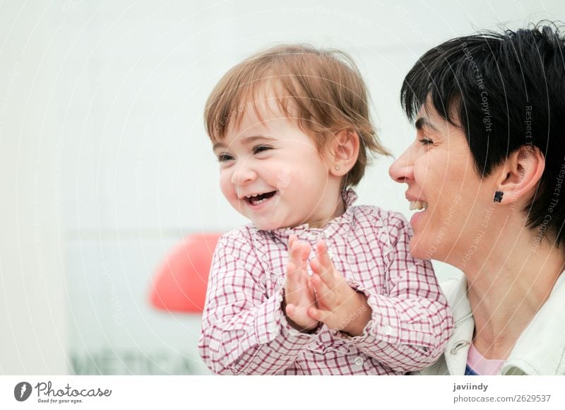 Woman and her cute little daughter are hugging Lifestyle Joy Happy Beautiful Playing Child Human being Feminine Baby Girl Adults Mother Family & Relations