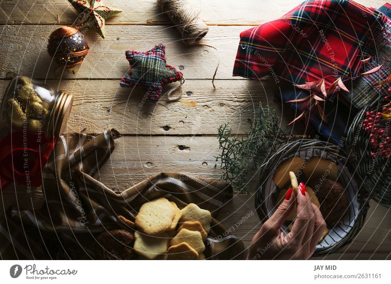 Woman keeping Christmas cookies, Photographed from above Dessert Style Beautiful Decoration Table Christmas & Advent Adults Hand 1 Human being Package Wood