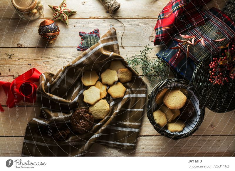 Woman keeping Christmas cookies, Photographed from above Food Cake Dessert Style Beautiful Decoration Table Christmas & Advent Adults Hand Package Wood Above