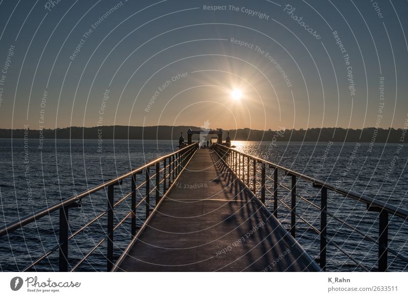 Sunrise at the Kieler Förde. Vacation & Travel Tourism Freedom Beach Ocean Environment Nature Landscape Water Sky Cloudless sky Sunset Sunlight Weather Bridge