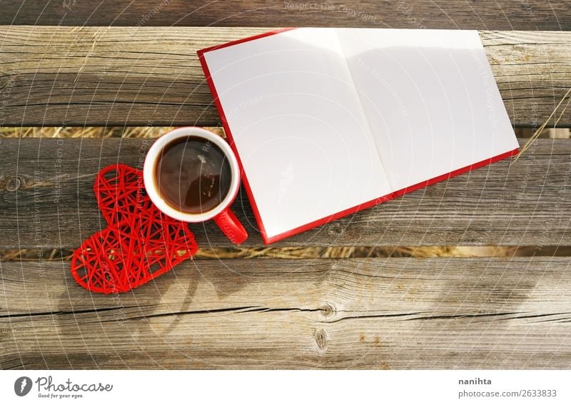 Red mug with coffee in a wooden bench outdoors in the morning Breakfast Beverage Hot drink Coffee Tea Cup Mug Winter Book Reading Autumn Warmth Paper Wood Heart