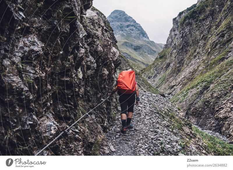 Ascent to the Kemptner Hut Adventure Mountain Hiking Young woman Youth (Young adults) 18 - 30 years Adults Nature Landscape Weather Rock Alps Backpack