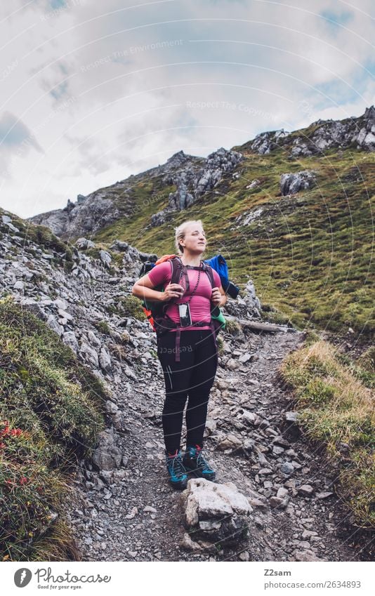 Young woman climbing to the summit Leisure and hobbies Adventure Hiking Sports Youth (Young adults) 18 - 30 years Adults Nature Landscape Sky Autumn Rock Alps