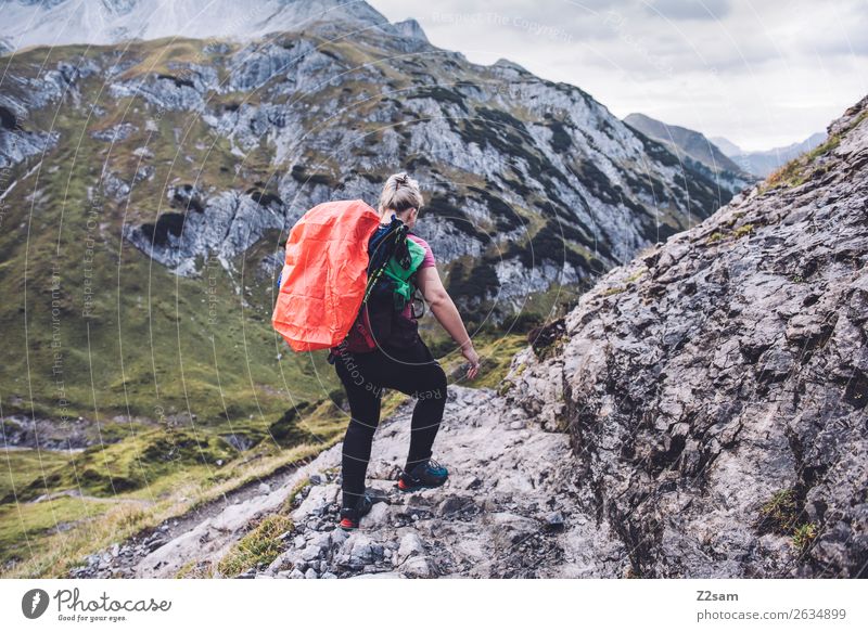 Descent to Holzgau Vacation & Travel Adventure Hiking Young woman Youth (Young adults) 30 - 45 years Adults Nature Beautiful weather Rock Alps Mountain Peak