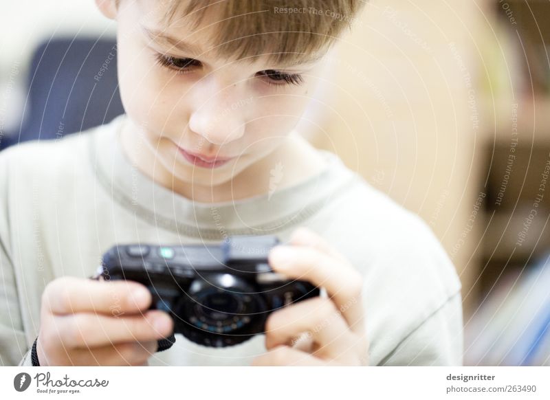 successful Leisure and hobbies Take a photo Photography Camera Child Boy (child) 8 - 13 years Infancy Art Artist Media Smiling Looking Bright Joy Contentment