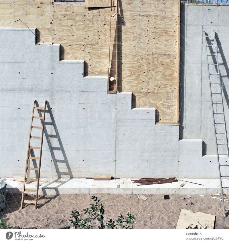 Concrete, wood and ladders Manmade structures Architecture Wall (barrier) Wall (building) Stairs Facade Ladder Wood Sharp-edged Simple Large Tall Brown Gray