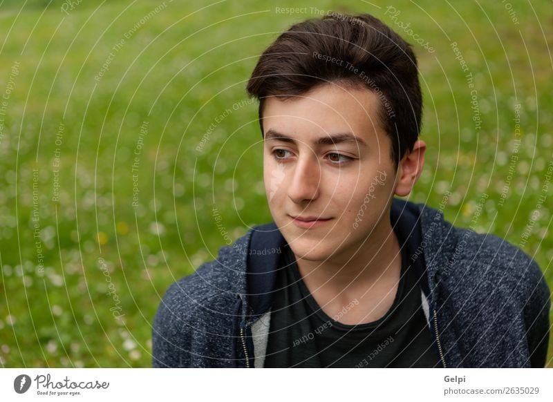 Attractive teenager guy in a park Lifestyle Style Happy Beautiful Hair and hairstyles Face Summer Human being Boy (child) Man Adults Youth (Young adults) Nature