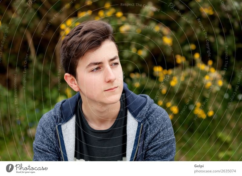 Attractive teenager guy in a park Lifestyle Style Happy Beautiful Hair and hairstyles Face Summer Human being Boy (child) Man Adults Youth (Young adults) Nature