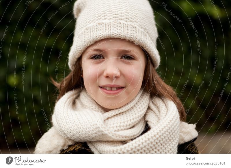 Pretty girl with wool hat in a park Joy Happy Beautiful Face Winter Garden Child Human being Toddler Woman Adults Family & Relations Infancy Nature Autumn