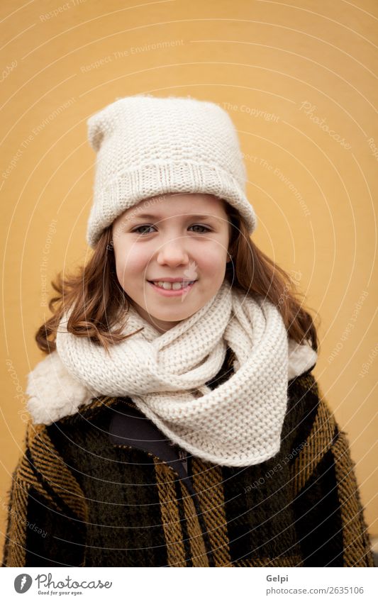 Pretty little girl in the street Joy Happy Beautiful Face Winter Child Human being Toddler Woman Adults Family & Relations Infancy Autumn Warmth Street Fashion