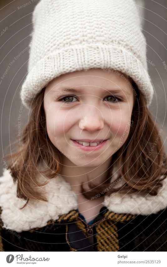 Beautiful girl with wool hat at winter Joy Happy Face Winter Child Human being Toddler Woman Adults Family & Relations Infancy Autumn Warmth Street Fashion Hat