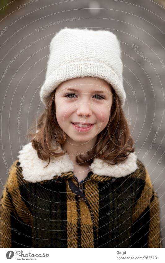 Beautiful girl with wool hat at winter Joy Happy Face Winter Child Human being Toddler Woman Adults Family & Relations Infancy Autumn Warmth Street Fashion Hat