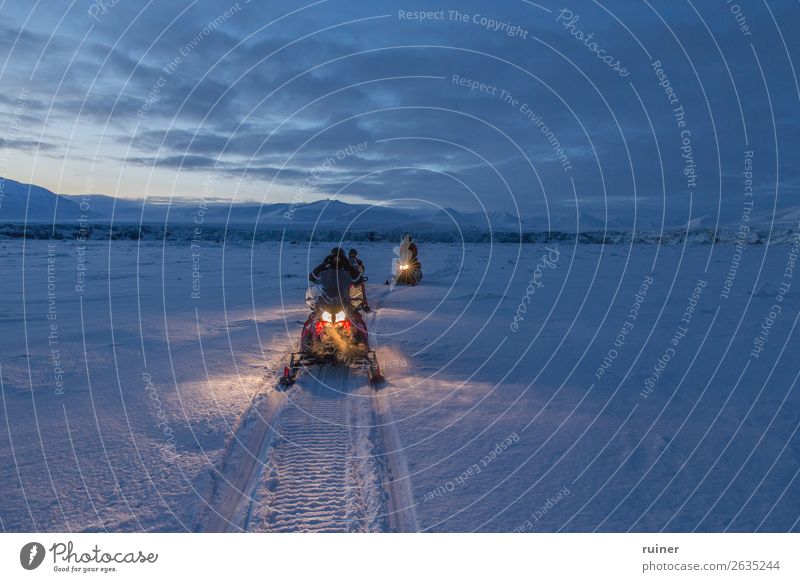 Snowmobile tour at dusk snowmobile Spitzbergen Tourism Mountain Landscape Norway The Arctic Exterior shot Scandinavia North Winter polar Cold Vacation & Travel