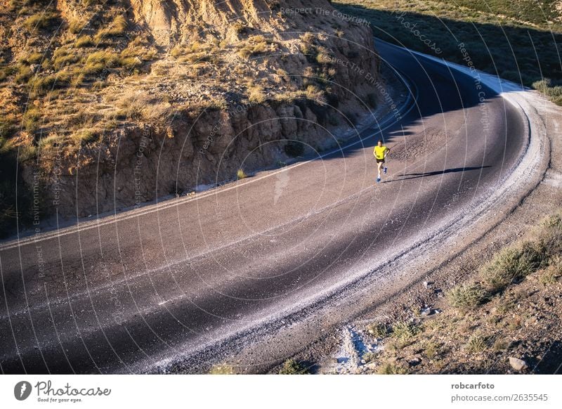 Young man running with greenish yellow shirt Lifestyle Sun Sports Jogging Human being Man Adults Park Bridge Movement Fitness Athletic Speed White young healthy