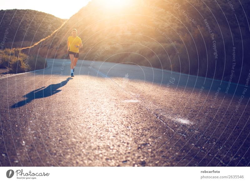 Young man running with greenish yellow shirt Lifestyle Sun Sports Jogging Human being Man Adults Park Bridge Movement Fitness Athletic Speed White young healthy