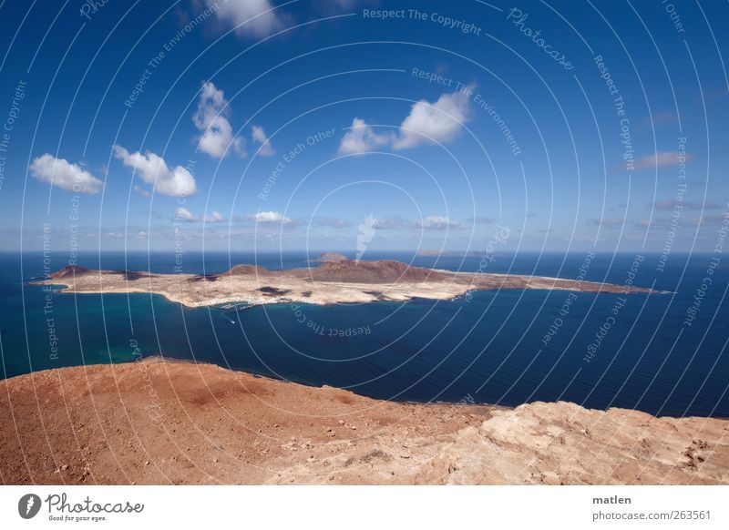 la isleta Landscape Earth Sand Water Sky Clouds Sunlight Beautiful weather Rock Mountain Coast Ocean Island Village Deserted Ferry Harbour Dry Blue Brown wide