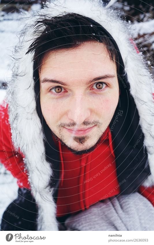 Young and attractive man enjoying a snowy winter day Joy Happy Winter Snow Human being Masculine Young man Youth (Young adults) Man Adults 1 18 - 30 years