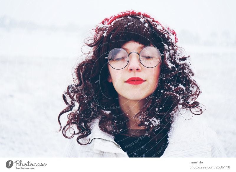 Young and pretty woman enjoying a snowy winter day Lifestyle Style Happy Face Wellness Senses Calm Meditation Leisure and hobbies Freedom Winter Snow