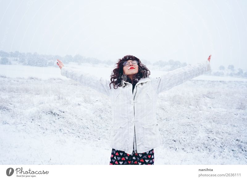 Young and pretty woman enjoying a snowy winter day Lifestyle Style Happy Face Leisure and hobbies Adventure Freedom Winter Snow Winter vacation