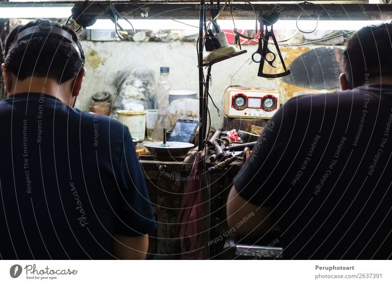 Jewelers at work, craftsmanship in a jewelry workshop. Shopping Design Decoration Work and employment Profession Industry Craft (trade) Business Tool