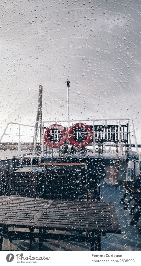 View from the inside of a boat to window with raindrops Water Drops of water Movement Weather Change in the weather Rain Rainwater Raincloud Window pane Pane