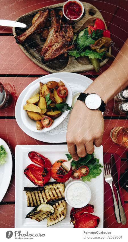 Top view of the plates of two persons in a restaurant Food Meat Nutrition Eating Lunch Organic produce Healthy Restaurant Mediterranean grilled vegetables