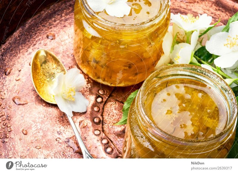 Homemade jam with jasmine flowers food sweet organic fresh healthy natural dessert glass Philadelphus homemade jar summer jelly marmalade preserve spoon