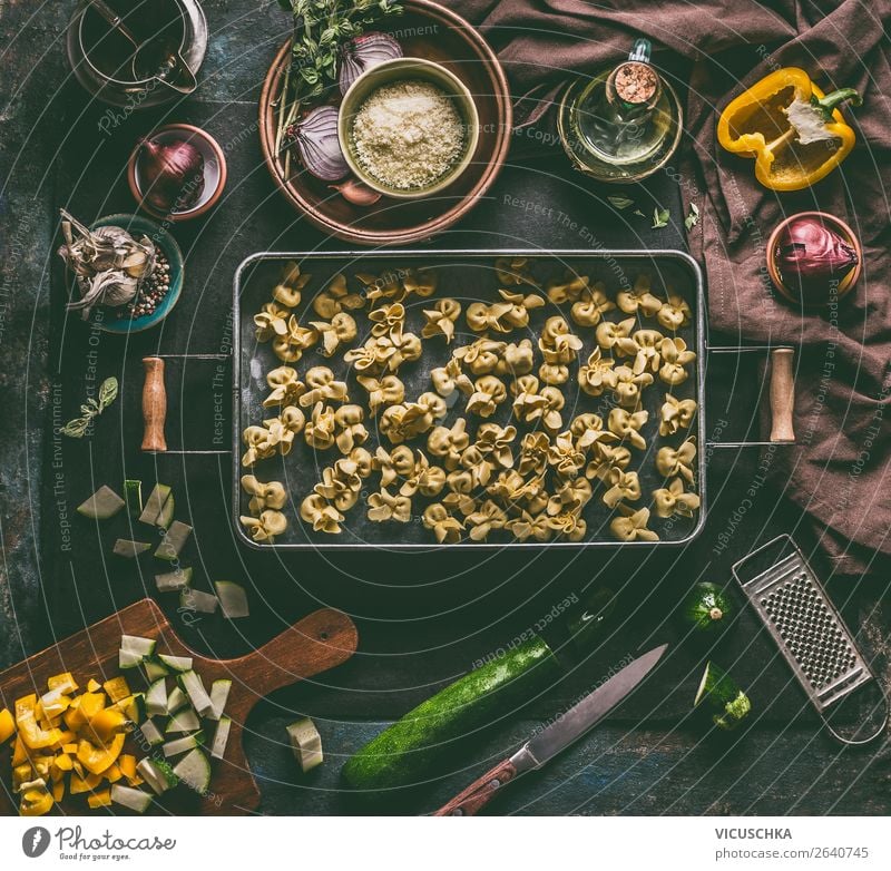 Vegetarian tortellini on the kitchen table with ingredients Food Vegetable Dough Baked goods Nutrition Lunch Dinner Organic produce Vegetarian diet Diet