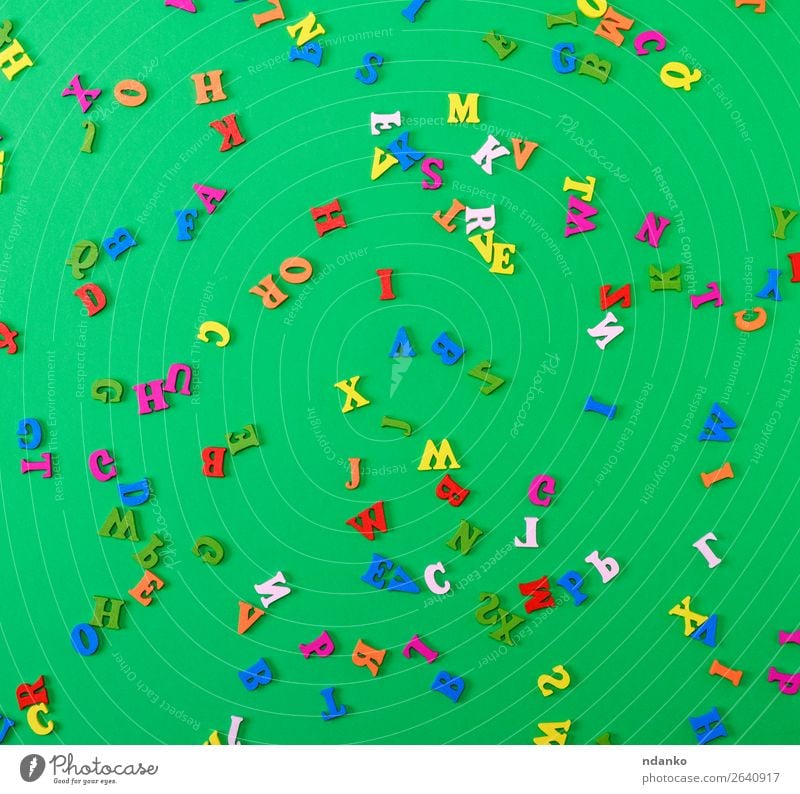 multi-colored letters of the English alphabet are scattered Lifestyle Joy Child School Toys Wood Study Bright Small Multicoloured Green Colour Idea background