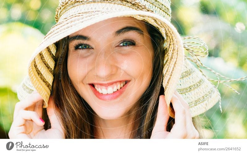 Happy and beautiful girl with pamela Joy Beautiful Summer Human being Woman Adults Hand Nature Tree Park Smiling Laughter Cute Green Pink Beauty Photography