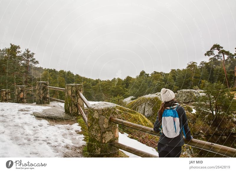 Hiking, woman hiker enjoying the scenery in the snowy forest Lifestyle Beautiful Vacation & Travel Trip Adventure Freedom Winter Snow Winter vacation Mountain