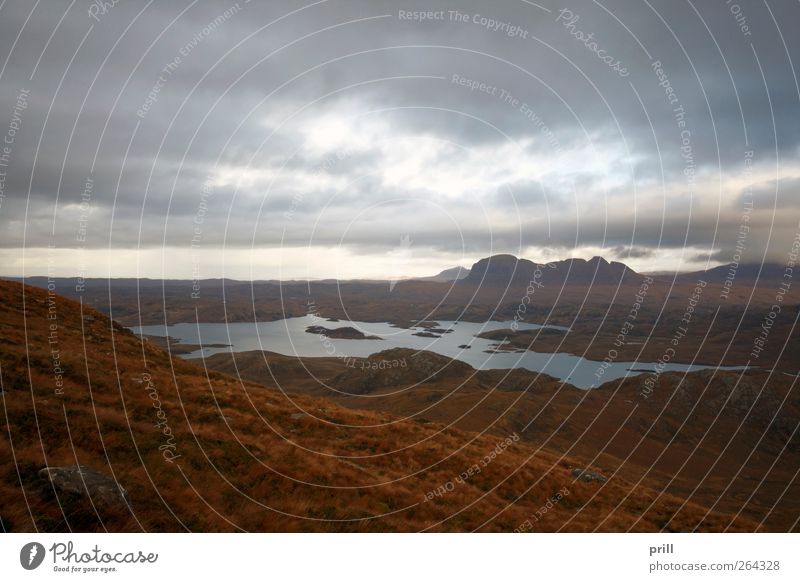 surreal landscape around Stac Pollaidh Vacation & Travel Tourism Adventure Mountain Environment Nature Landscape Plant Water Clouds Grass Bushes Peak Lake