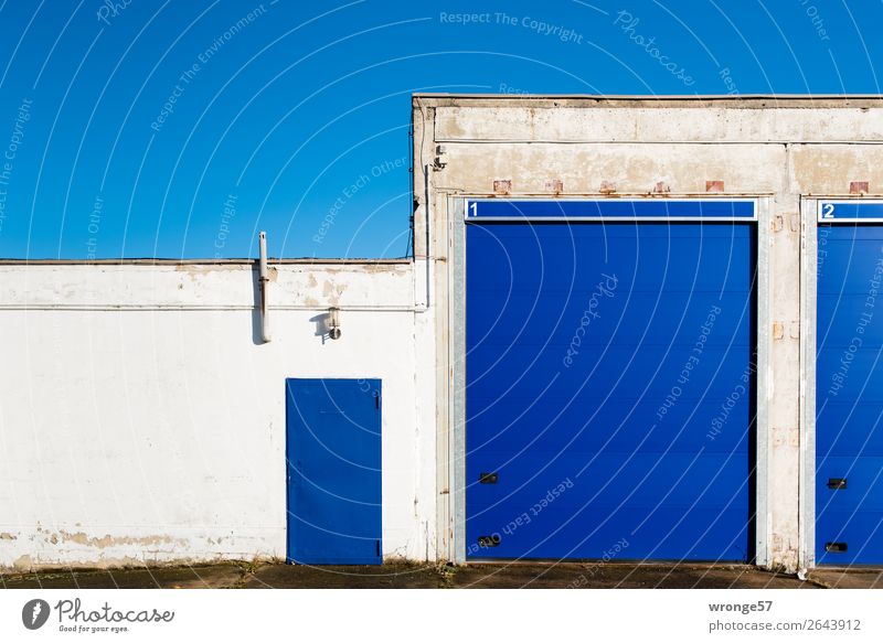 Junk Gate 1 Garage Wall (barrier) Wall (building) Facade Entrance Front door Main gate Blue White Garage door Blue sky Rolling door Landscape format