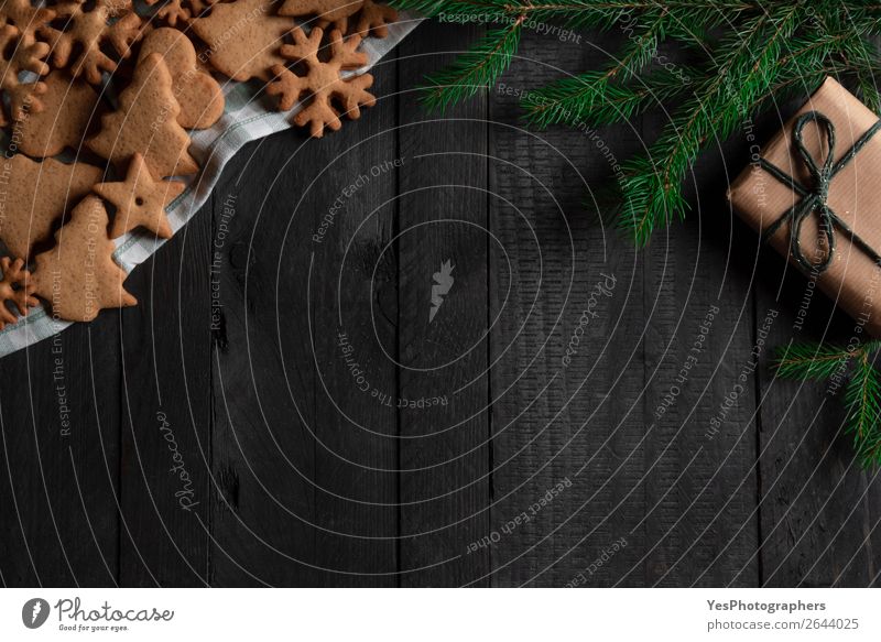 Christmas gingerbread cookies and gift. Xmas frame Dessert Winter Table Feasts & Celebrations Christmas & Advent Wood Happiness Tradition above view backdrop