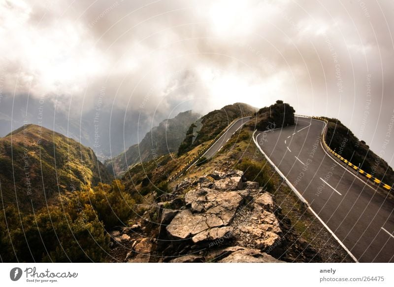 180° Landscape Sky Clouds Weather Fog Mountain Street Overpass Curve Dark Brown Turn back Rock Madeira Peak Steep Contrast Colour photo Exterior shot Deserted