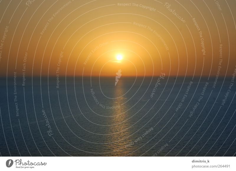 sunset over water Sun Ocean Waves Environment Nature Landscape Sky Horizon Coast Dream Blue Serene Colour Sunset Open clear nowhere orange Set seascape Ripple