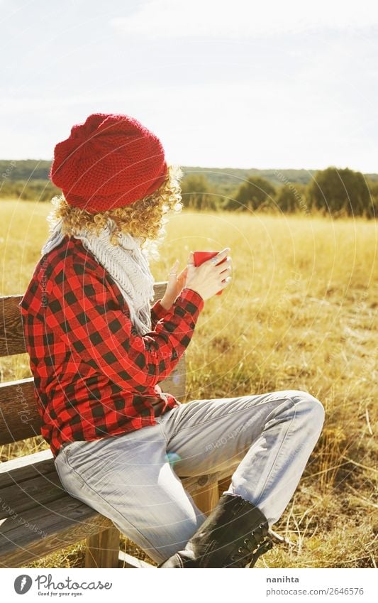 A young woman from behind in taking a cup of coffee Breakfast Beverage Hot drink Coffee Tea Lifestyle Wellness Relaxation Calm Vacation & Travel Adventure