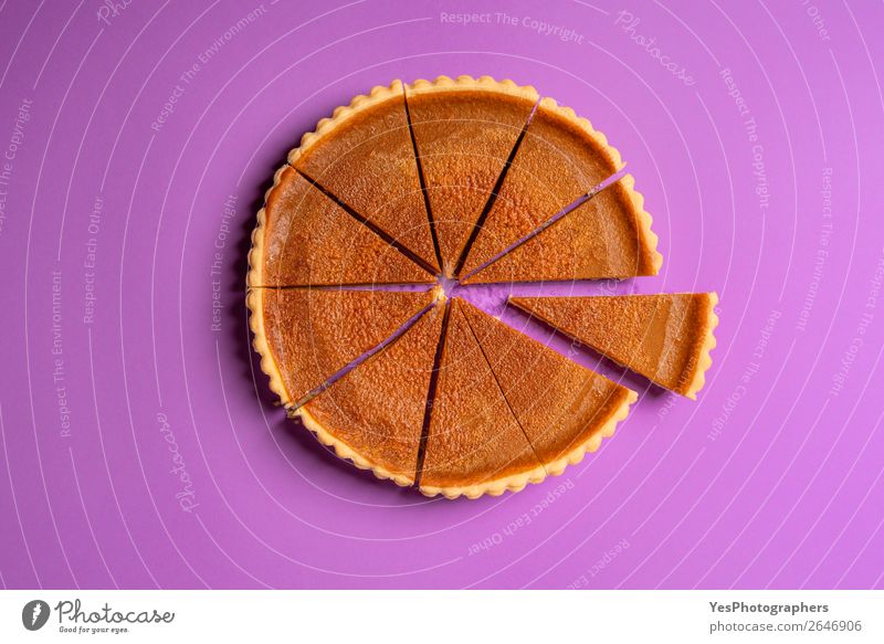 Sliced pumpkin pie and a separate piece. Top view. Cake Dessert Candy Thanksgiving Sweet Violet Tradition Divide Thanksgiving day above view American Baking