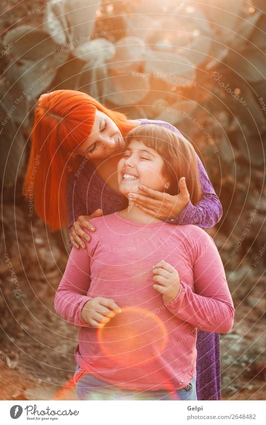 Red haired mom and her daughter Lifestyle Joy Happy Beautiful Playing Summer Parenting Child Woman Adults Parents Mother Family & Relations Infancy Park Street