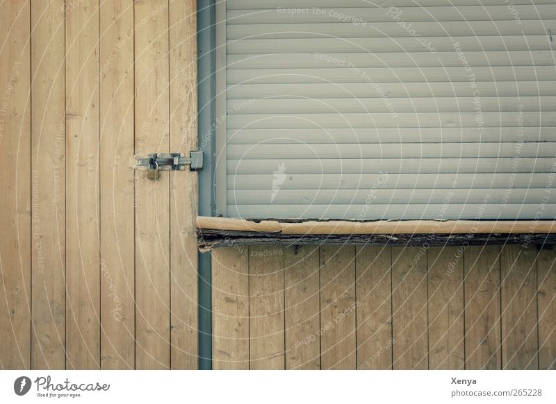 Access is blocked. Hut Door Venetian blinds Padlock Wood Plastic Old Dirty Broken Closed Going Subdued colour Exterior shot Deserted Day Central perspective