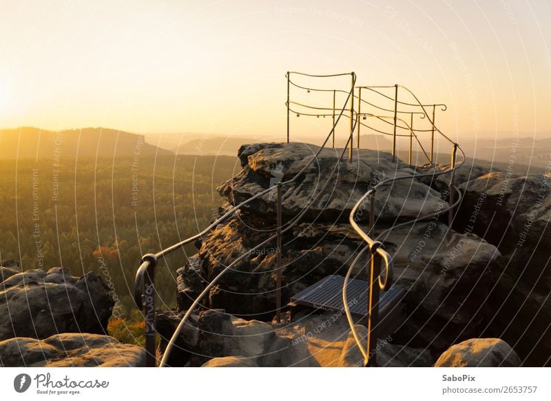 Golden Evening Environment Nature Landscape Sky Cloudless sky Horizon Sunlight Autumn Beautiful weather Rock Mountain Peak Illuminate Hiking Yellow Gray Orange