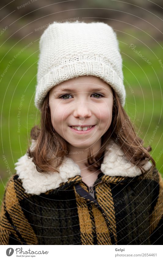 Pretty girl in a park at winter Joy Happy Beautiful Face Winter Garden Child Human being Toddler Woman Adults Family & Relations Infancy Nature Autumn Warmth