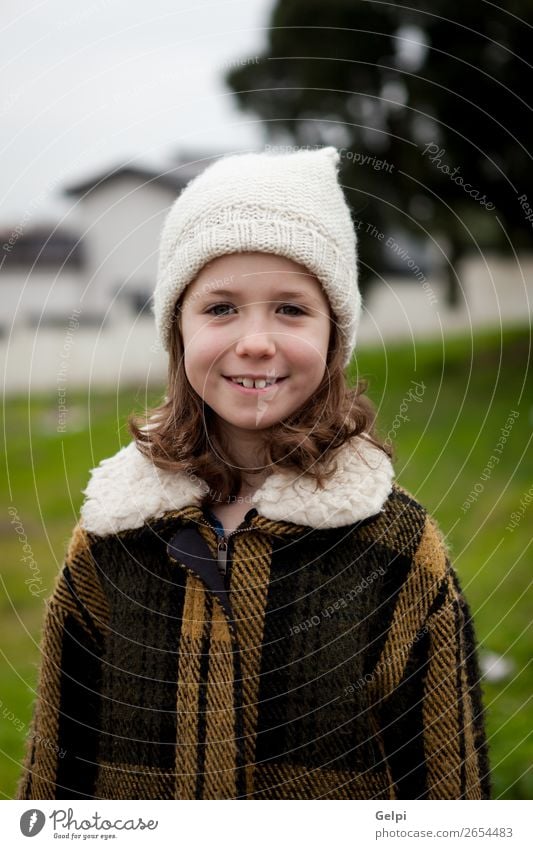 Pretty little girl in the street Joy Happy Beautiful Face Winter House (Residential Structure) Child Human being Toddler Woman Adults Family & Relations Infancy