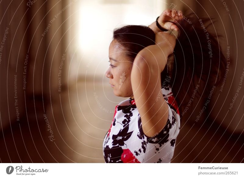 Woman tying back her hair. Feminine Young woman Youth (Young adults) Adults Head Arm 1 Human being 18 - 30 years Beautiful Thin Movement Braids Ponytail Bond