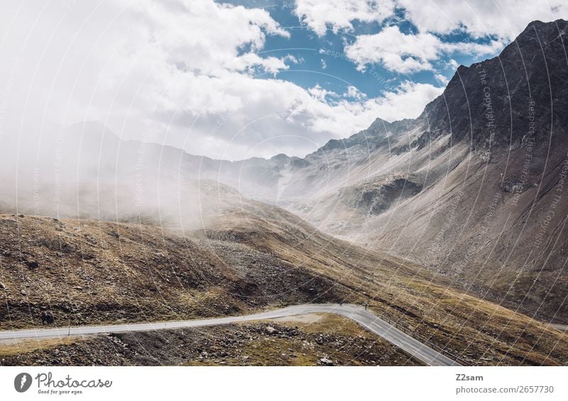 Timmelsjoch pass road | E5 Environment Nature Landscape Sky Clouds Autumn Beautiful weather Alps Mountain Gigantic Tall Adventure Loneliness Idyll